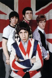 Photo of The Who in front of Union Jack by Colin Jones