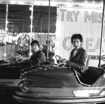 The Who's Keith Moon and John Entwistle rides a bumper car before the band's performance at Pier Pavillion in Felixstowe, Suffolk, UK on Sept. 9th, 1966