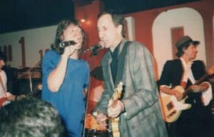 Pete Townshend and Mick Jagger perform on February 23, 1986