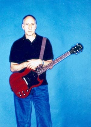 Photo of Pete Townshend with a Guitar to be auctioned