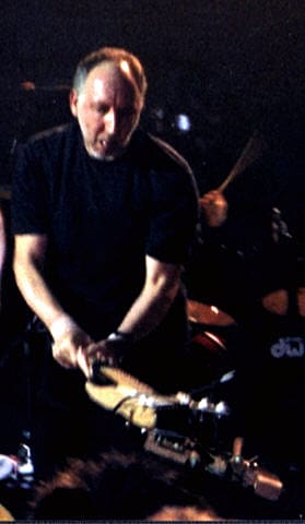 Pete Townshend smashing a guitar on January 27, 2002