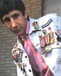 Pete Townshend as a young man wearing jacket with ribbons